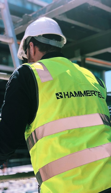 hammertech team member in safety vest
