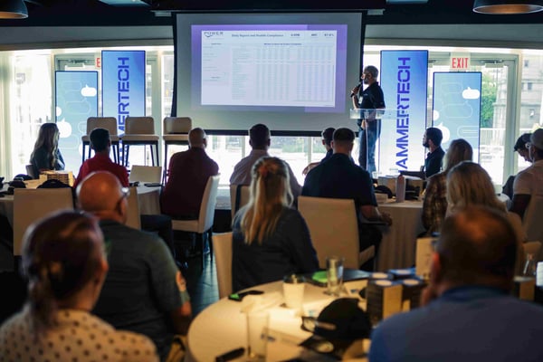 Speaker speaking at the North America HammerTech Community Event, showing participants as well.