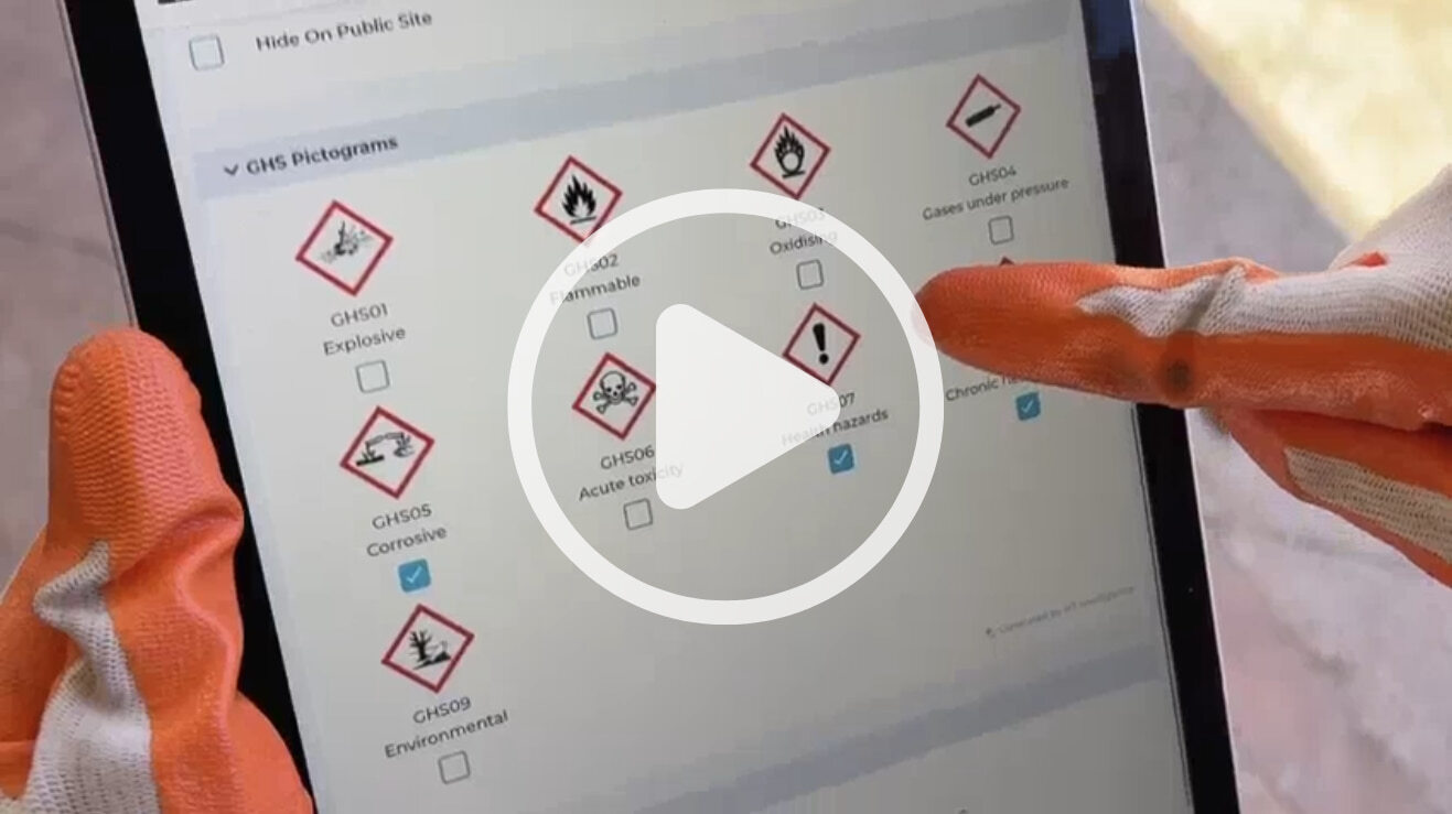 Construction site worker using HammerTech Intelligence in action video still with play button