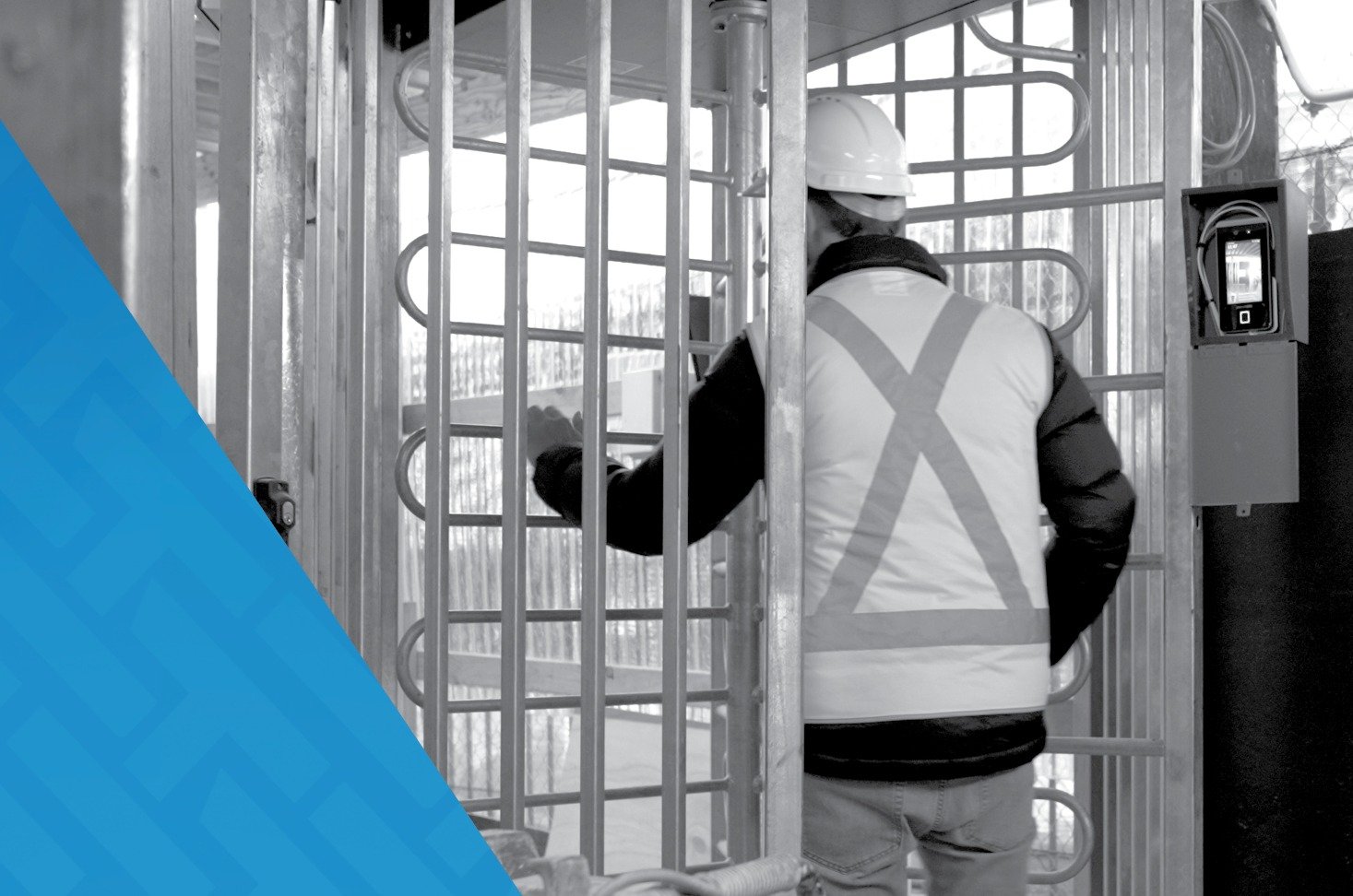 Construction Worker passing through Irongate construction site access turnstile.