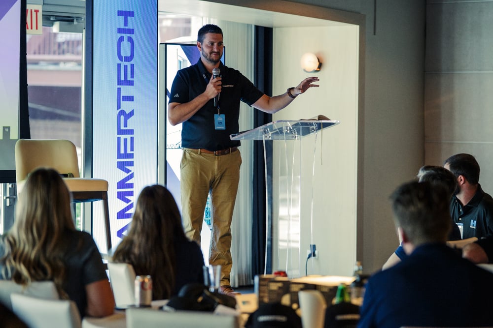 Dylan Hipple speaking at a HammerTech community event