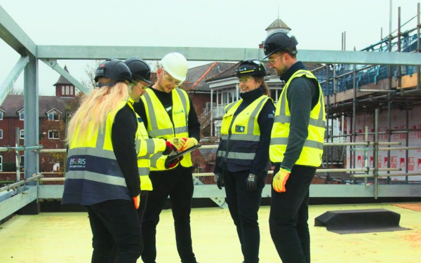 Elliott Group construction workers at the Belfry learning how to use HammerTech for safety and compliance