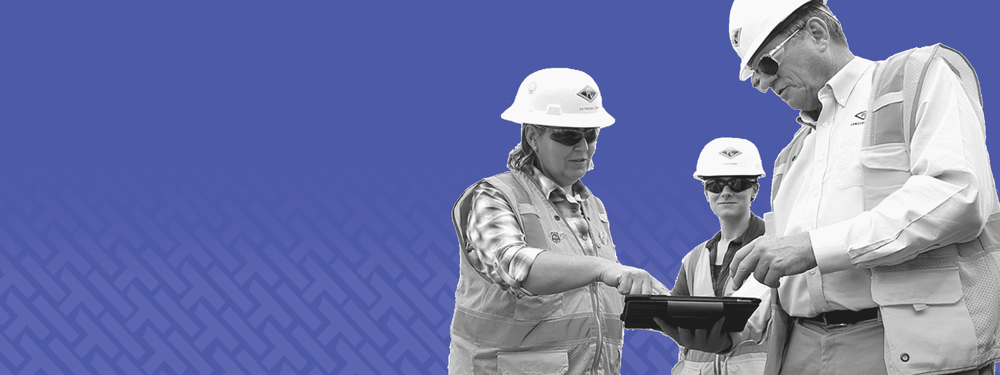 Black and white cut-out image of construction workers using HammerTech construction safety software on a tablet over purple HammerTech background.