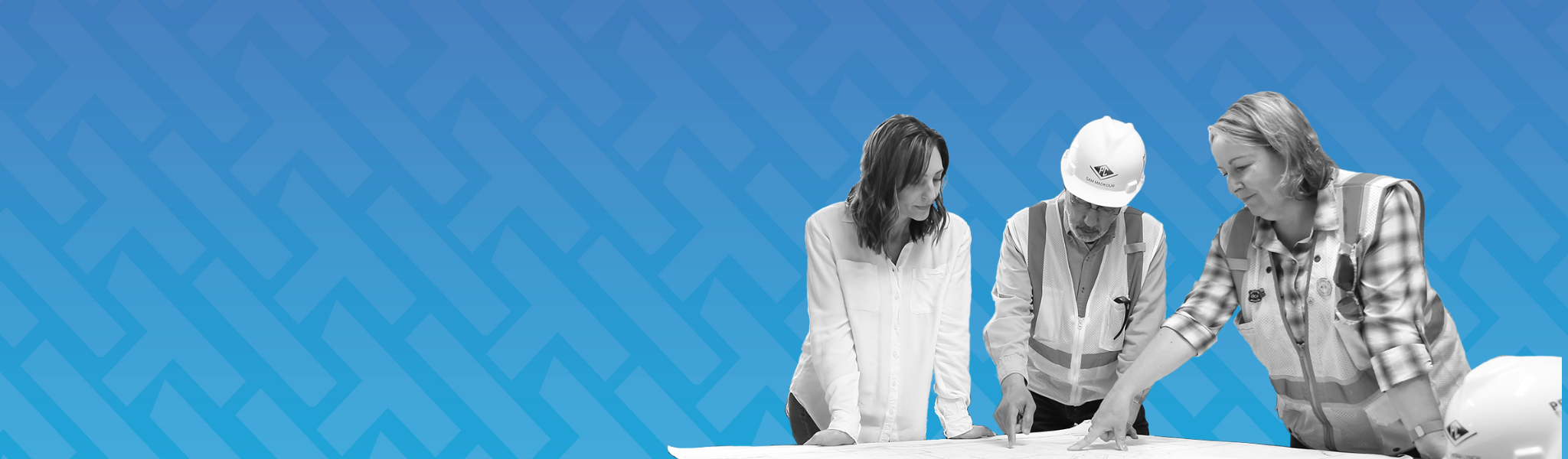 Shows two women looking together with a man at a blueprint or design plans. They are grayscale and the background is vibrant HammerTech light blue and purple fade.