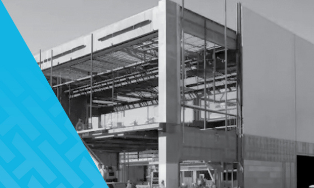 Beginning of a data center being constructed using HammerTech construction safety platform. Outside of a two-story building